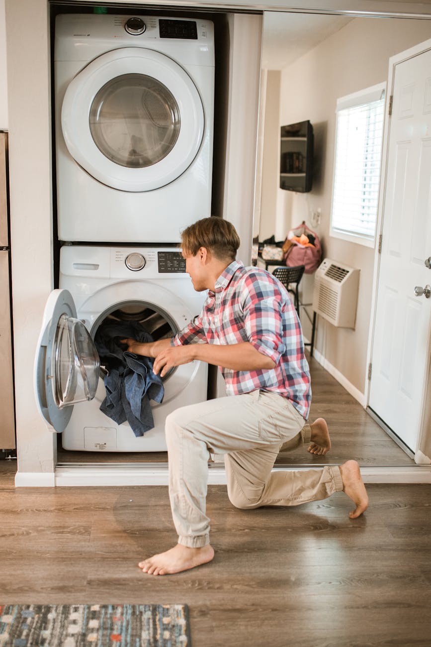 man doing laundry